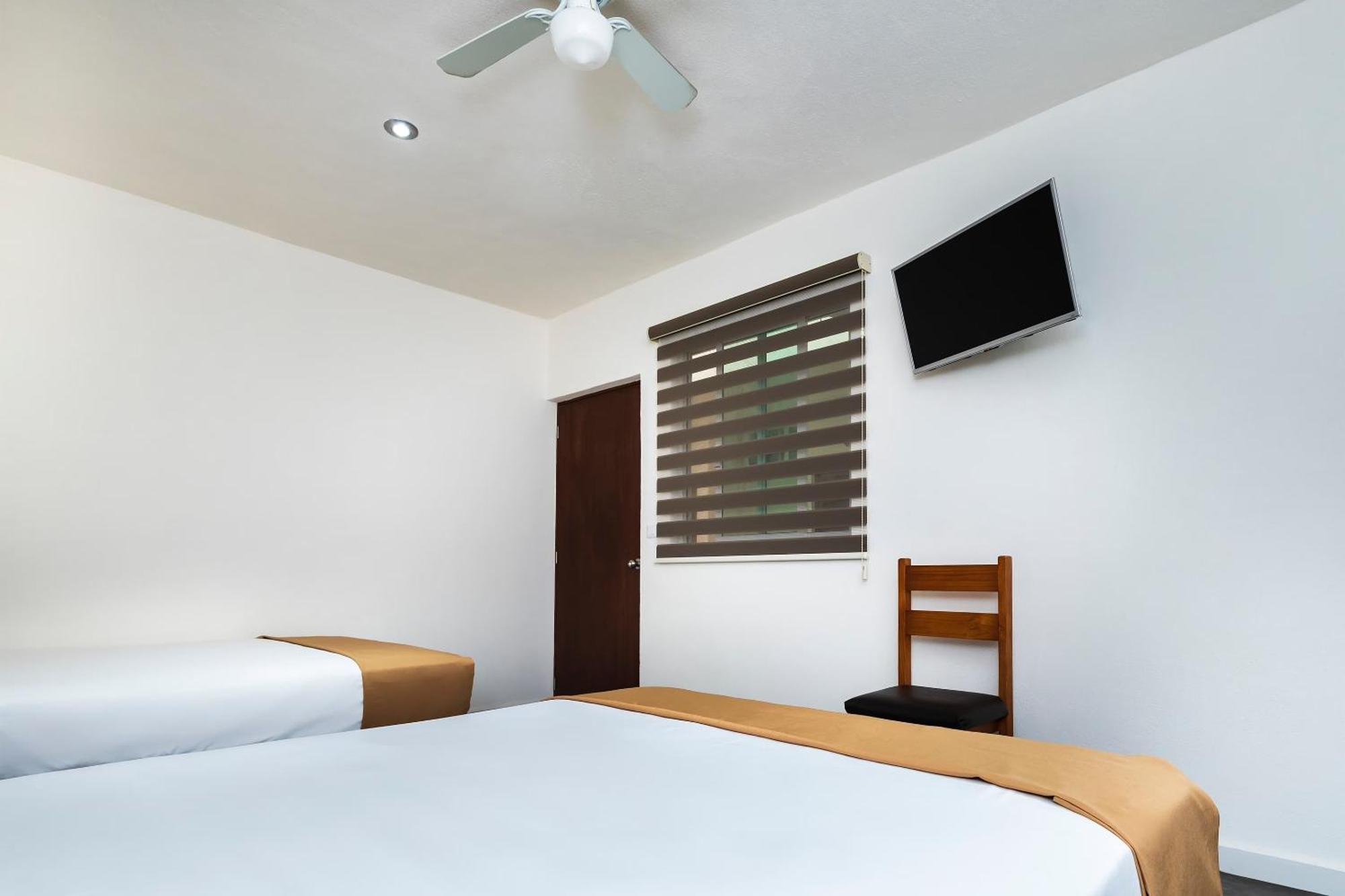 Capital O Hotel Joyma Suites, San Luis San Luis Potosi Exterior photo